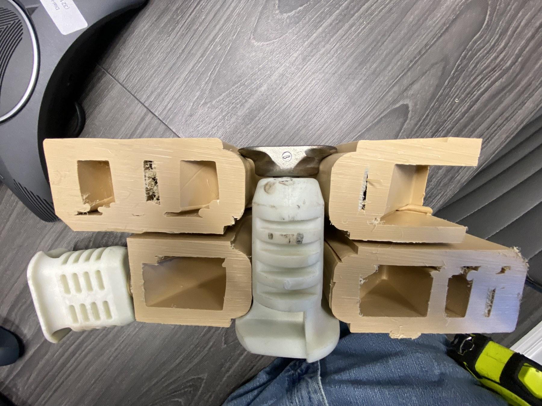 Sectioned mat joint with the locking pin engaged between adjoining sections