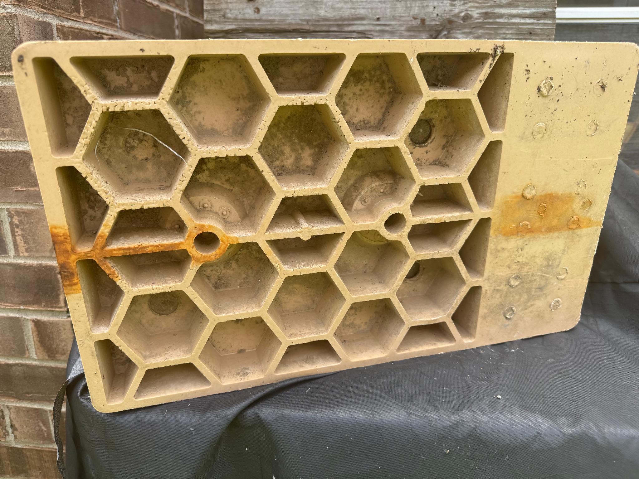 Reverse side of an early composite panel showing the molded honeycomb cells